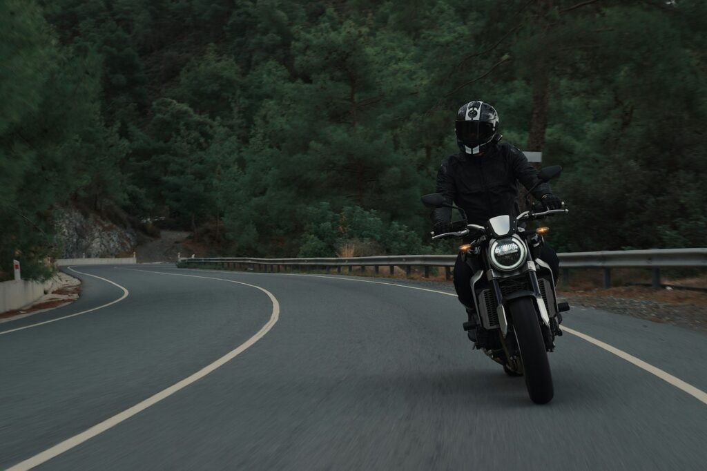 Motorcyclist riding on a city street