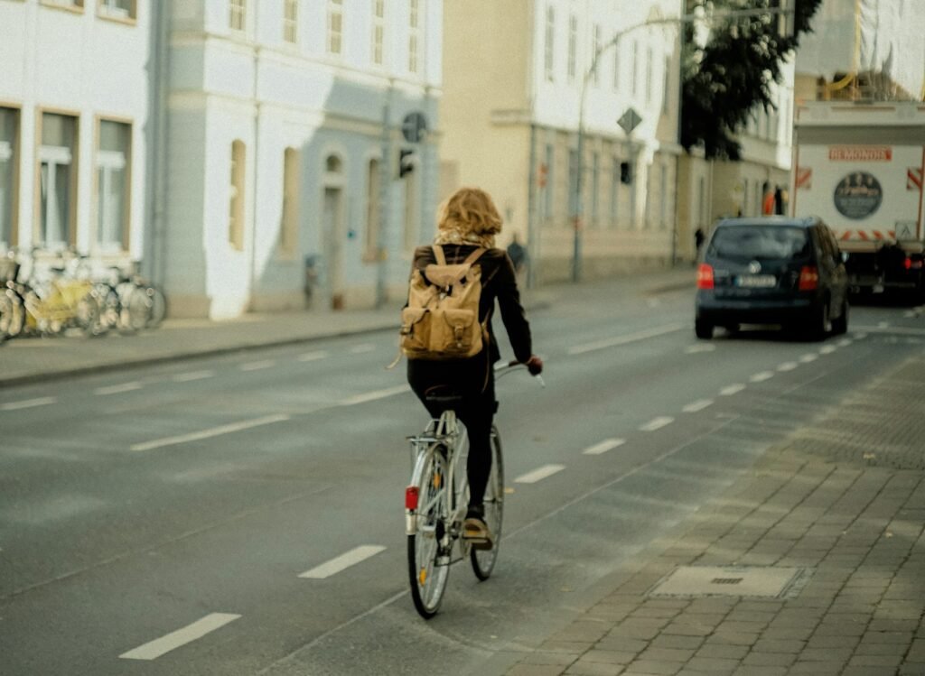 Cyclist riding a bicycle on a city street
