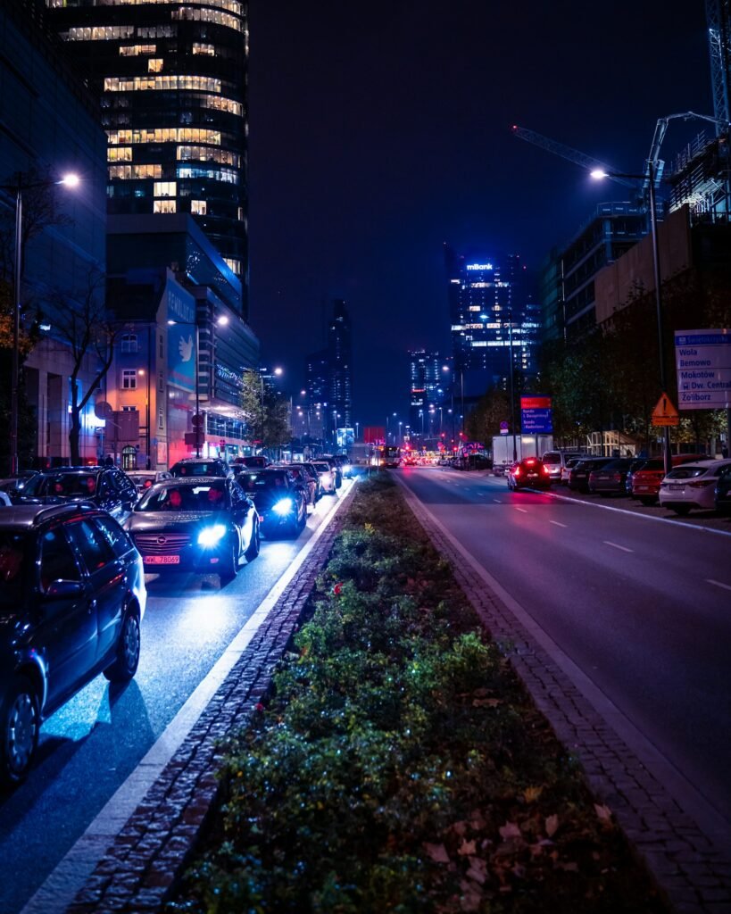 Cars driving on a city road at night